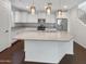 Modern kitchen with white cabinets, granite countertops and island at 4738 E Tierra Buena Ln, Phoenix, AZ 85032