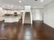 Modern kitchen with island, stainless steel appliances and staircase at 4738 E Tierra Buena Ln, Phoenix, AZ 85032