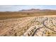 Aerial view of a desert community with mountain views at 47970 N Navidad Ct, Gold Canyon, AZ 85118