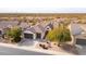 Aerial view of a house and surrounding desert landscape at 47970 N Navidad Ct, Gold Canyon, AZ 85118