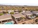 Community overview, showcasing homes with pools and desert landscape at 47970 N Navidad Ct, Gold Canyon, AZ 85118