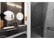 Modern bathroom with double vanity and walk-in shower at 47970 N Navidad Ct, Gold Canyon, AZ 85118