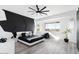 Main bedroom with a dramatic geometric wall and modern decor at 47970 N Navidad Ct, Gold Canyon, AZ 85118