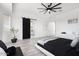 Main bedroom with modern barn door and ensuite bathroom at 47970 N Navidad Ct, Gold Canyon, AZ 85118