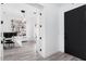 Bright home office with built-in shelving and modern desk at 47970 N Navidad Ct, Gold Canyon, AZ 85118