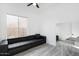 Spacious living room with large window and comfortable seating at 47970 N Navidad Ct, Gold Canyon, AZ 85118