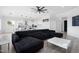 Open living room with large sectional sofa and kitchen views at 47970 N Navidad Ct, Gold Canyon, AZ 85118