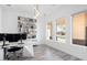 Bright office with built-in shelving and large windows at 47970 N Navidad Ct, Gold Canyon, AZ 85118