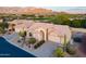 Single-story home with desert landscaping and mountain backdrop at 6069 S Sandtrap Dr, Gold Canyon, AZ 85118