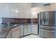 Kitchen features granite countertops, stainless steel appliances, and light wood cabinets at 6069 S Sandtrap Dr, Gold Canyon, AZ 85118