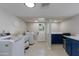 Laundry room with modern appliances and ample counter space at 6718 N 15Th St, Phoenix, AZ 85014