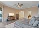 Bright main bedroom with a king-size bed, walk-in closet and ensuite bathroom at 7283 E Bent Tree Dr, Scottsdale, AZ 85266