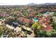 Aerial view of community with pool, tennis courts, and buildings at 9708 E Via Linda -- # 2322, Scottsdale, AZ 85258