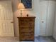 Bedroom with wooden dresser and closet at 9708 E Via Linda -- # 2322, Scottsdale, AZ 85258