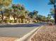 Gated entrance to community with guardhouse and landscaping at 9708 E Via Linda -- # 2322, Scottsdale, AZ 85258