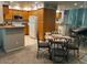 Bright kitchen adjacent to the dining area featuring stainless steel appliances and ample cabinet space at 9708 E Via Linda -- # 2322, Scottsdale, AZ 85258