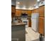 Functional kitchen with a combination of tile and carpet flooring, modern appliances, and ample cabinet space at 9708 E Via Linda -- # 2322, Scottsdale, AZ 85258