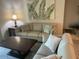 Comfortable living room featuring a neutral sofa, modern coffee table, and stylish wall art at 9708 E Via Linda -- # 2322, Scottsdale, AZ 85258