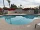 Inviting kidney-shaped pool with spa and lounge chairs at 9708 E Via Linda -- # 2322, Scottsdale, AZ 85258