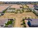 Aerial view of neighborhood park and surrounding new construction homes at 11029 E Ulysses Ave, Mesa, AZ 85212