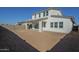 Backyard features covered patio, block wall and dirt landscaping at 11029 E Ulysses Ave, Mesa, AZ 85212