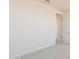 Spacious bedroom featuring wall to wall carpet, neutral walls and an adjoining doorway at 11029 E Ulysses Ave, Mesa, AZ 85212