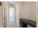 Hallway featuring built in desk area and carpeted floors at 11029 E Ulysses Ave, Mesa, AZ 85212