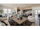 Spacious living room with modern decor and an open layout with access to the kitchen at 11029 E Ulysses Ave, Mesa, AZ 85212