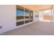 Covered patio with seamless sliding glass doors to bring the outside in at 11029 E Ulysses Ave, Mesa, AZ 85212