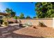 Relaxing backyard with gravel, fire pit, and seating area at 1220 N Cliffside Dr, Gilbert, AZ 85234