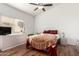 Spacious bedroom with wood flooring and ample closet space at 1220 N Cliffside Dr, Gilbert, AZ 85234