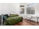 Cozy bedroom with daybed, built-in desk, and window seat at 1220 N Cliffside Dr, Gilbert, AZ 85234
