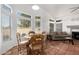 Small dining area with wooden table and chairs at 1220 N Cliffside Dr, Gilbert, AZ 85234