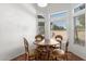 Bright dining area with wooden table and chairs at 1220 N Cliffside Dr, Gilbert, AZ 85234