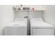 Convenient laundry room with washer and dryer at 1220 N Cliffside Dr, Gilbert, AZ 85234