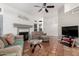 Living room features tiled floors, fireplace, and comfy seating at 1220 N Cliffside Dr, Gilbert, AZ 85234