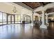 Spacious lobby with hardwood floors and large windows at 1220 N Cliffside Dr, Gilbert, AZ 85234