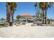Relaxing patio area with lake views and seating at 1220 N Cliffside Dr, Gilbert, AZ 85234