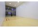 Indoor racquetball court with hardwood floors at 1220 N Cliffside Dr, Gilbert, AZ 85234