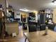 Functional kitchen with dark cabinets and island at 12629 S Tuthill Rd, Buckeye, AZ 85326