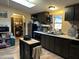 Kitchen with dark cabinets and island at 12629 S Tuthill Rd, Buckeye, AZ 85326