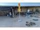 Partially covered patio with outdoor furniture and a bicycle at 12629 S Tuthill Rd, Buckeye, AZ 85326
