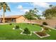 Landscaped backyard oasis with putting green and spa at 13454 N 88Th Pl, Scottsdale, AZ 85260