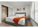 Spacious bedroom with a king-size bed and built-in closet at 13454 N 88Th Pl, Scottsdale, AZ 85260