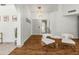 Elegant entryway with hardwood floors and modern light fixtures at 13454 N 88Th Pl, Scottsdale, AZ 85260