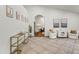 Stylish entryway with hardwood floors, modern decor, and a view of the living room at 13454 N 88Th Pl, Scottsdale, AZ 85260