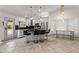 Modern kitchen with granite countertops, stainless steel appliances, and an island at 13454 N 88Th Pl, Scottsdale, AZ 85260