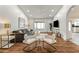Bright and airy living room with hardwood floors and stylish furnishings at 13454 N 88Th Pl, Scottsdale, AZ 85260
