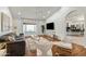 Open concept living room with a view of the kitchen and backyard at 13454 N 88Th Pl, Scottsdale, AZ 85260