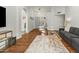 Spacious living area with hardwood floors and comfortable seating at 13454 N 88Th Pl, Scottsdale, AZ 85260